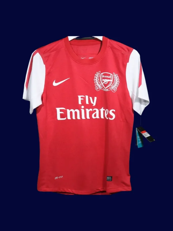 front view of 125th anniversary retro player-version jersey (11/12) with slim fit and commemorative accents.