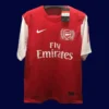 Arsenal 125Th Anniversary Retro Jersey 1112A - KFCool – Football Jerseys & Soccer Kits Store front view of 125th anniversary retro football jersey with commemorative detailing (11/12).