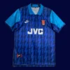 front view of blue away retro football jersey (94/95) with classic styling and vintage collar.