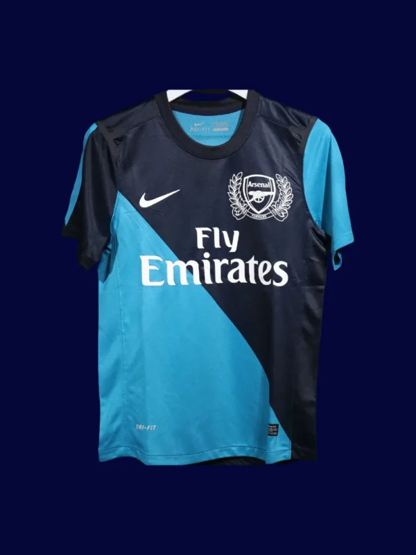 front view of away retro football jersey in deep color with player cut (11/12) and slim fit.