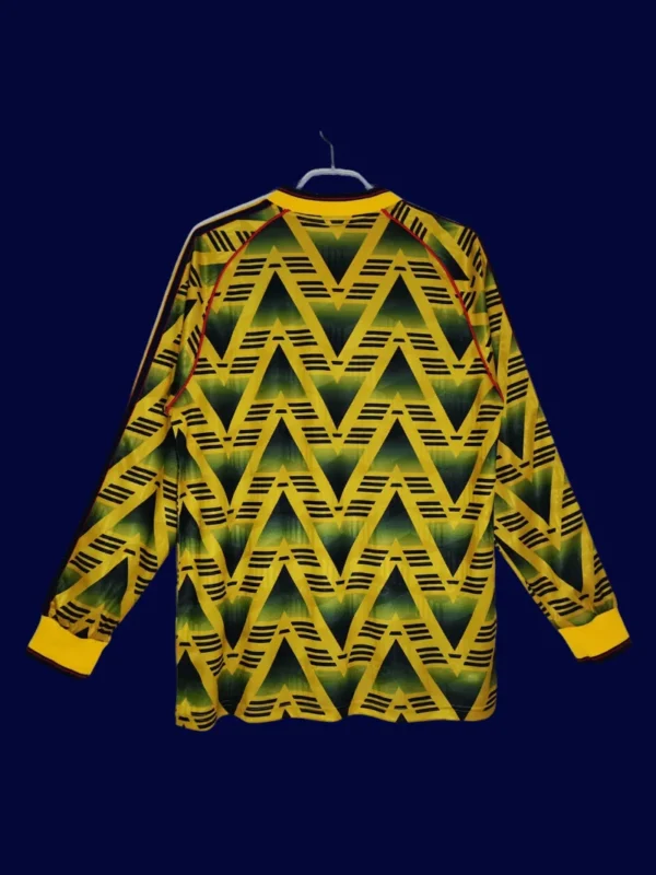 back view of long sleeve away retro football jersey (91/93) showing extended back panel and sewn seams.