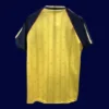 back view of yellow away retro football jersey (88/89) showing reinforced number panel.
