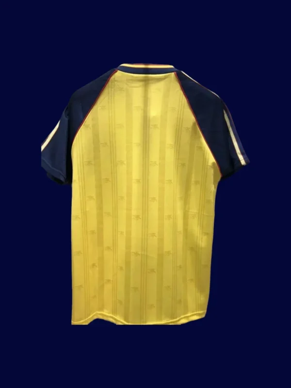 back view of yellow away retro football jersey (88/89) showing reinforced number panel.
