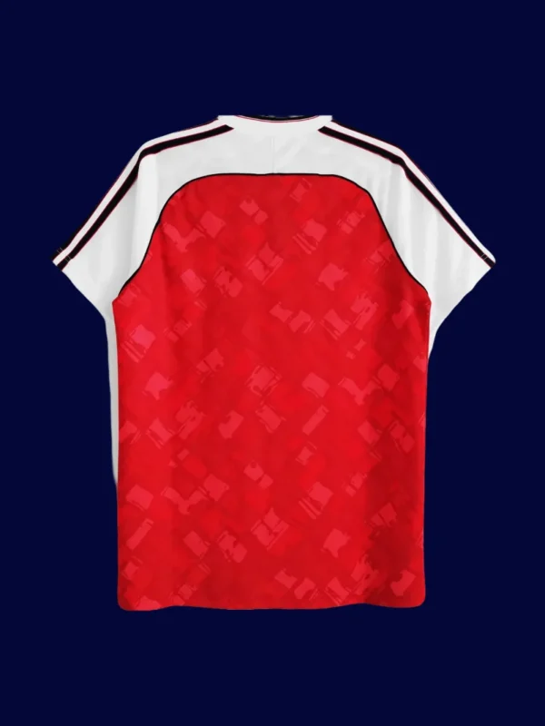 back view of red home retro football jersey (90/92) showing reinforced back panel and number zone.