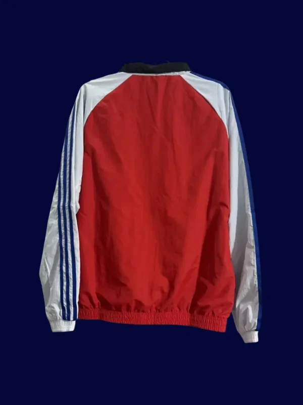 back view of reversible windbreaker showing reverse colorway and tidy seams (24/25).