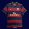 front view of third retro football jersey (07/08) with distinctive color blocks and retro collar.