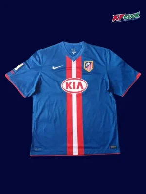 Atlético Madrid 2010 11 away retro jersey front with alternate tones and crest