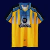 front view of Chelsea away yellow retro jersey (95/97) with vintage collar.