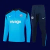 Chelsea Blue Tracksuit 2425A - kfcool.com front view of Chelsea blue tracksuit (24/25) with zip-up jacket and elastic cuffs.