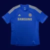 front view of Chelsea home blue retro jersey (12/13) with classic crew neck.