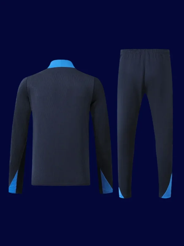 back view of Chelsea tracksuit (2025) showing smooth back panel and ergonomic seam design.