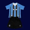 Gremio home kids kits 25/26 front blue black white stripes