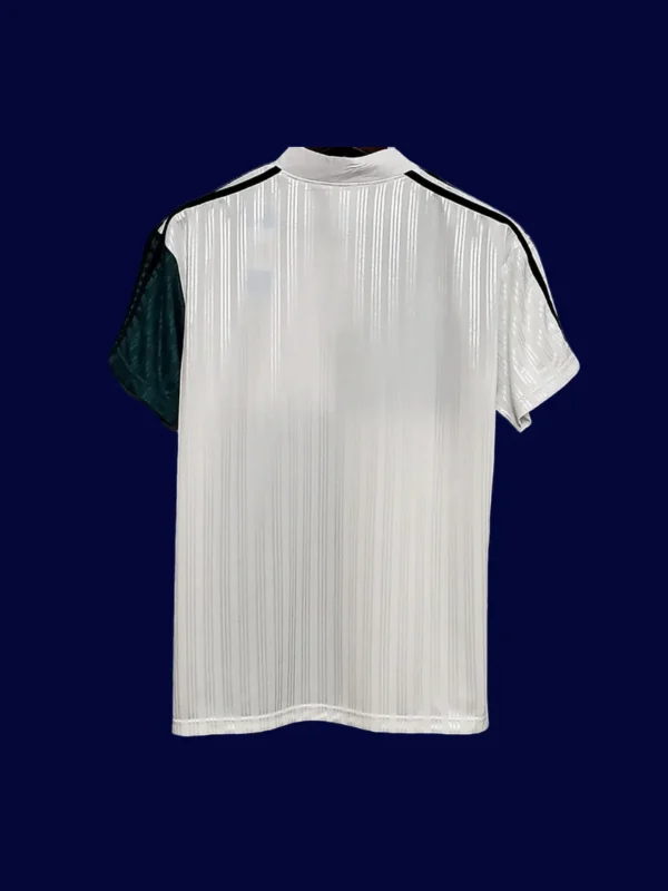 back view of Liverpool away green retro jersey (95/96) showing stitched back panel.