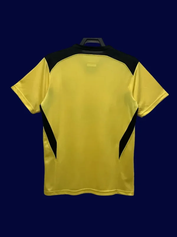 Liverpool Away Yellow Retro Jersey 0405B - KFCool – Football Jerseys & Soccer Kits Store back view of Liverpool away yellow retro jersey (04/05) showing number-ready back panel.