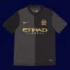 front view of Manchester City away black retro jersey (13/14) with long sleeves.