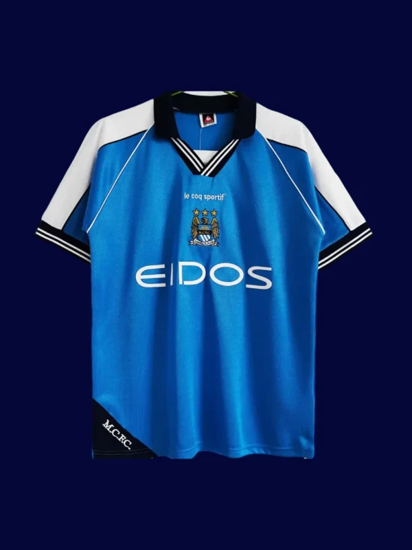 front view of Manchester City home blue retro jersey (99/01) with classic design.