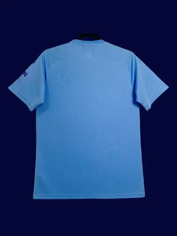 back view of home blue retro shirt (19/20) showing number-ready back panel.