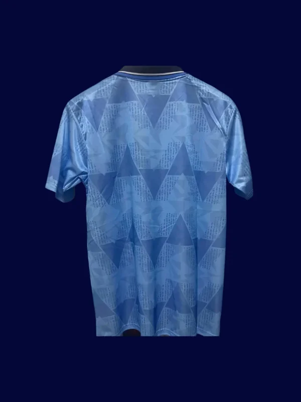 Manchester City Home Blue Retro shirt 1989B - KFCool – Football Jerseys & Soccer Kits Store back view of home blue retro shirt (1989) showing stitched back panel.