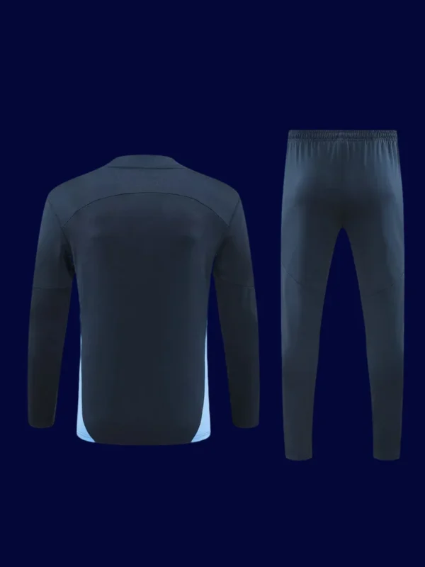 back view of Manchester City tracksuit (24/25) showing smooth back and ergonomic seams.
