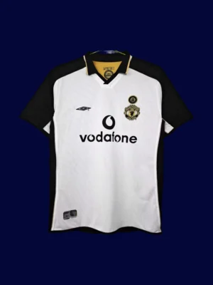 front view of Manchester United 100th Centenary retro jersey (01/02) in red with commemorative detailing.