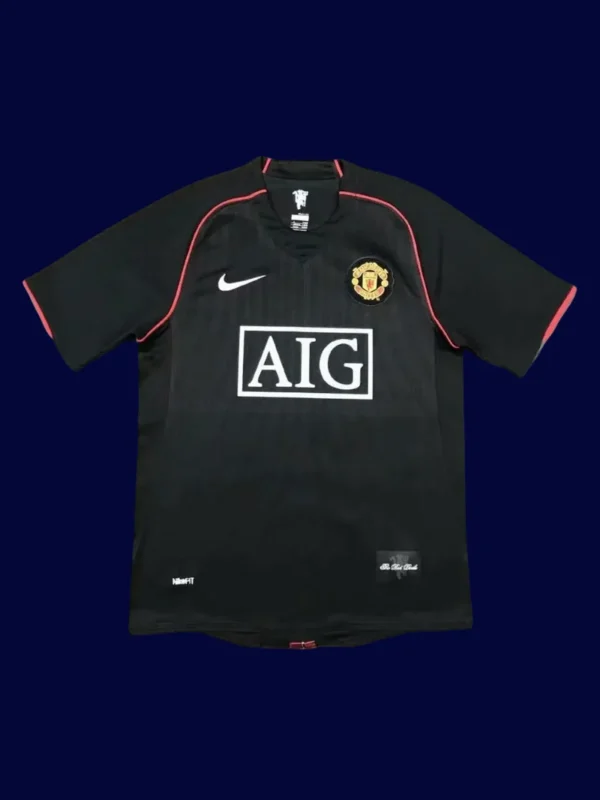 front view of Manchester United away black retro jersey (07/08) with classic trims.