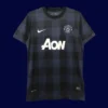 front view of Manchester United away black retro jersey (13/14) with classic long sleeves.