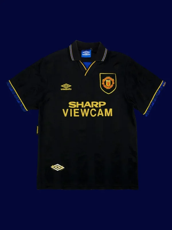 front view of Manchester United away black retro jersey (1994) with classic styling.