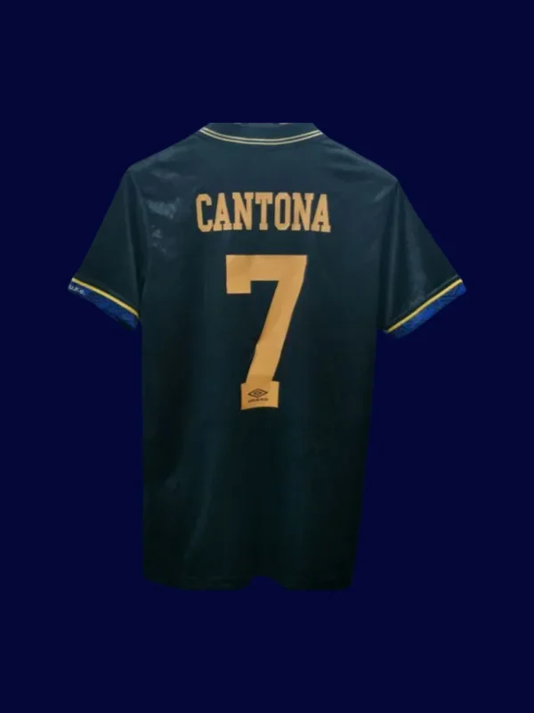 back view of away black retro jersey (1994) showing stitched back for number placement.