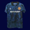 front view of Manchester United away blue retro jersey (92/93) with vintage trims.