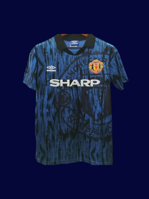 front view of Manchester United away blue retro jersey (92/93) with vintage trims.