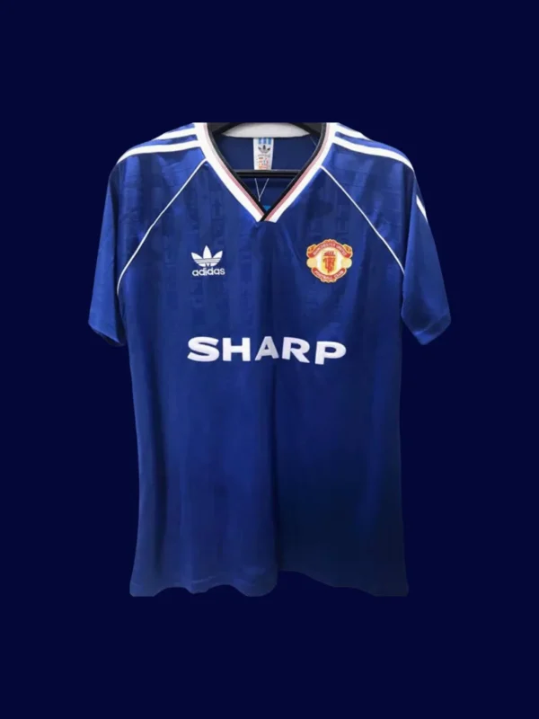 front view of Manchester United away blue retro soccer jersey (88/90) with classic fit.