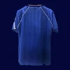 back view of away blue retro soccer jersey (88/90) showing stitched back and number area.