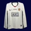 Manchester United Away UCL Retro Long Sleeve Jersey 0809A - KFCool – Football Jerseys & Soccer Kits Store front view of Manchester United away UCL retro long sleeve jersey (08/09) with blue base and vintage trims.