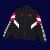 front view of Manchester United black windbreaker (24/25) with zip and elastic cuffs.