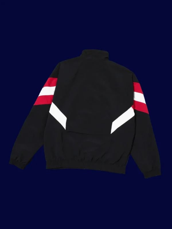 back view of black windbreaker (24/25) showing smooth back panel and ventilation seams.