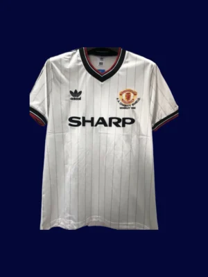 front view of Manchester United FA Cup Final retro jersey (1983) in red with classic trims.