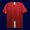 back view of Manchester United home red retro jersey (07/08) showing reinforced back panel for numbers.
