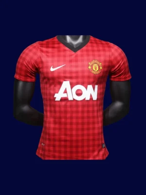 front view of Manch2ester United home red player-fit retro jersey (12/13) with slim athletic cut.