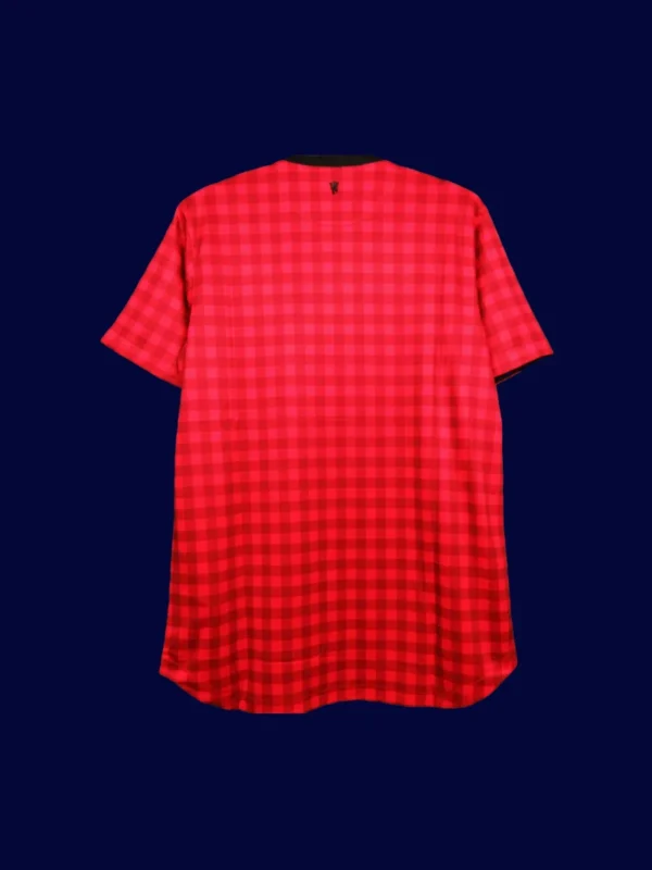 back view of home red retro jersey (12/13) showing number-ready back panel.