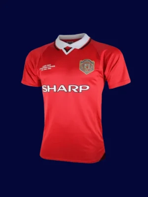 front view of Manchester United home red retro jersey (1999) with traditional collar.