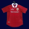 Manchester United Home Red Retro Jersey 1999B - kfcool.com front view of Manchester United home red retro jersey (1999) with traditional collar.