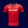 front view of Manchester United home red retro jersey (94/96) with traditional collar.
