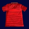back view of home red retro jersey (94/96) showing stitched back and number-ready panel.