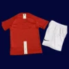 back view of home red retro kids kit (07/08) showing small-number panel and child-friendly seam.