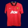 front view of Manchester United home retro player-fit jersey (13/14) in red with slim fit.