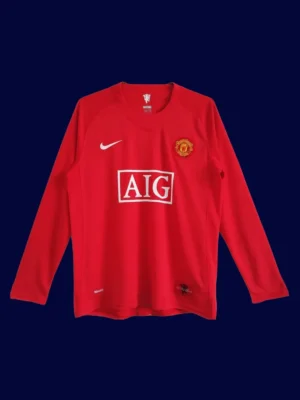Manchester United Home Retro Long Sleeve Jersey 0708A front view of Manchester United home retro long sleeve jersey (07/08) in red with classic cuffs.