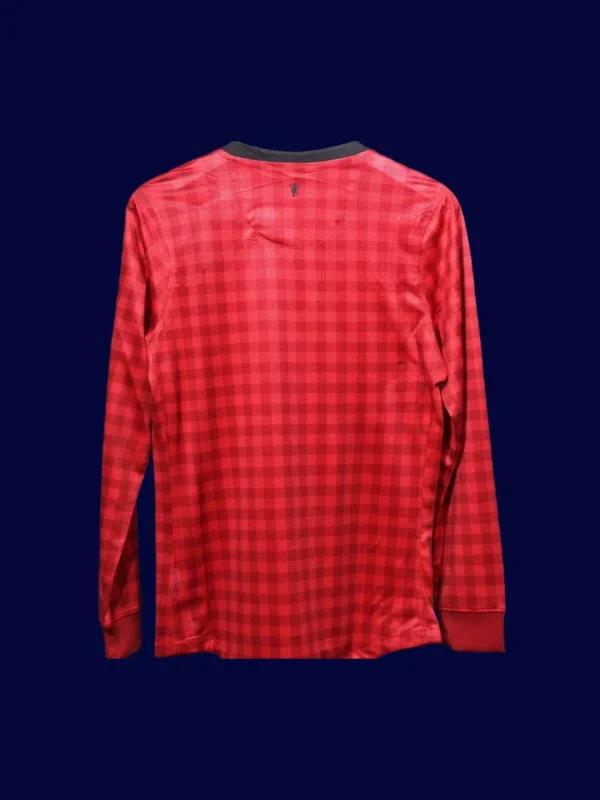 back view of long sleeve player-fit home retro jersey (12/13) showing reinforced number area.