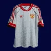 front view of Manchester United Winners Cup Final retro jersey (1991) in red.