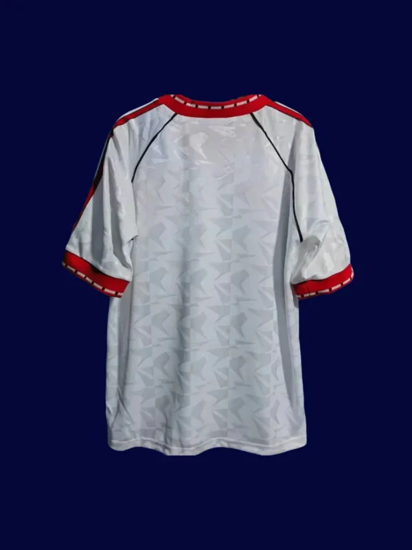 back view of Winners Cup Final retro jersey (1991) showing stitched back and number area.