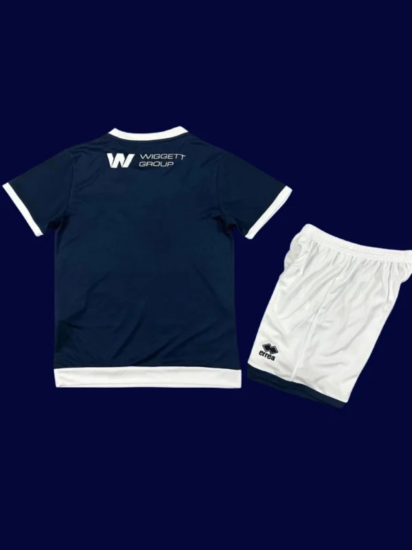 Millwall Home Kids Kits 25/26 front with mini crest and youth-friendly fit.